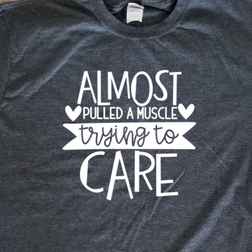 Almost Pulled a Muscle Trying to Care - unisex tee
